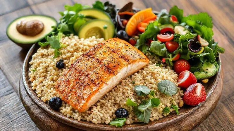 A vibrant, photorealistic spread of healthy, unprocessed foods: grilled salmon, quinoa, a large colorful salad with dark leafy greens, avocado, berries, and nuts. All arranged beautifully on a wooden table with natural light, professional photography, 8K, cinematic lighting, sharp focus, depth of field, shot on a high-end DSLR. A vibrant, photorealistic spread of healthy, unprocessed foods: grilled salmon, quinoa, a large colorful salad with dark leafy greens, avocado, berries, and nuts. All arranged beautifully on a wooden table with natural light, professional photography, 8K, cinematic lighting, sharp focus, depth of field, shot on a high-end DSLR.