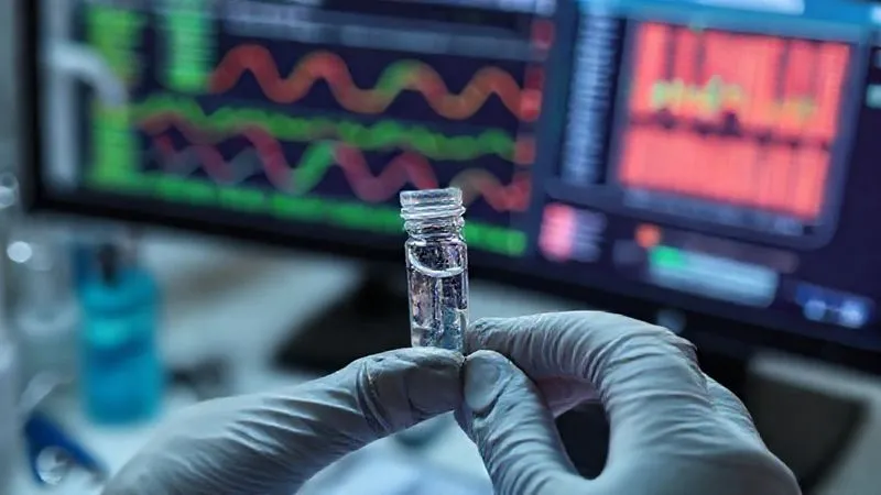 A photorealistic, professional photography shot of a dental professional's hands, wearing gloves, holding a small vial with a swab, symbolizing microbiological testing for gum pathogens. In the background, subtly blurred, are dental tools and a computer screen displaying a complex genetic analysis chart. Cinematic lighting, sharp focus on the vial, depth of field, 8K hyper-detailed, shot on a high-end DSLR. A photorealistic, professional photography shot of a dental professional's hands, wearing gloves, holding a small vial with a swab, symbolizing microbiological testing for gum pathogens. In the background, subtly blurred, are dental tools and a computer screen displaying a complex genetic analysis chart. Cinematic lighting, sharp focus on the vial, depth of field, 8K hyper-detailed, shot on a high-end DSLR.