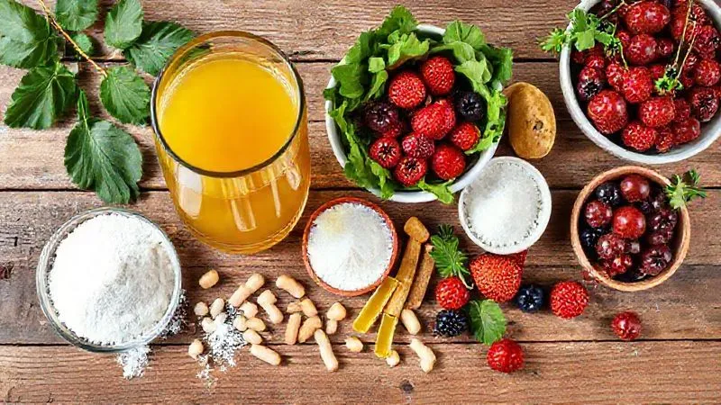 A photorealistic, vibrant flat lay of various gut-healing foods and supplements, including a glass of bone broth, a bowl of leafy greens, a handful of colorful berries, a scoop of L-glutamine powder, and a few probiotic capsules, all arranged aesthetically on a rustic wooden table under natural lighting. 8K, sharp focus on the items, with a gentle depth of field. A photorealistic, vibrant flat lay of various gut-healing foods and supplements, including a glass of bone broth, a bowl of leafy greens, a handful of colorful berries, a scoop of L-glutamine powder, and a few probiotic capsules, all arranged aesthetically on a rustic wooden table under natural lighting. 8K, sharp focus on the items, with a gentle depth of field.